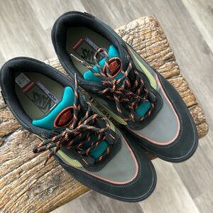 Vans Wayvee, lace-up skate shoes, black with green and orange accent trim.